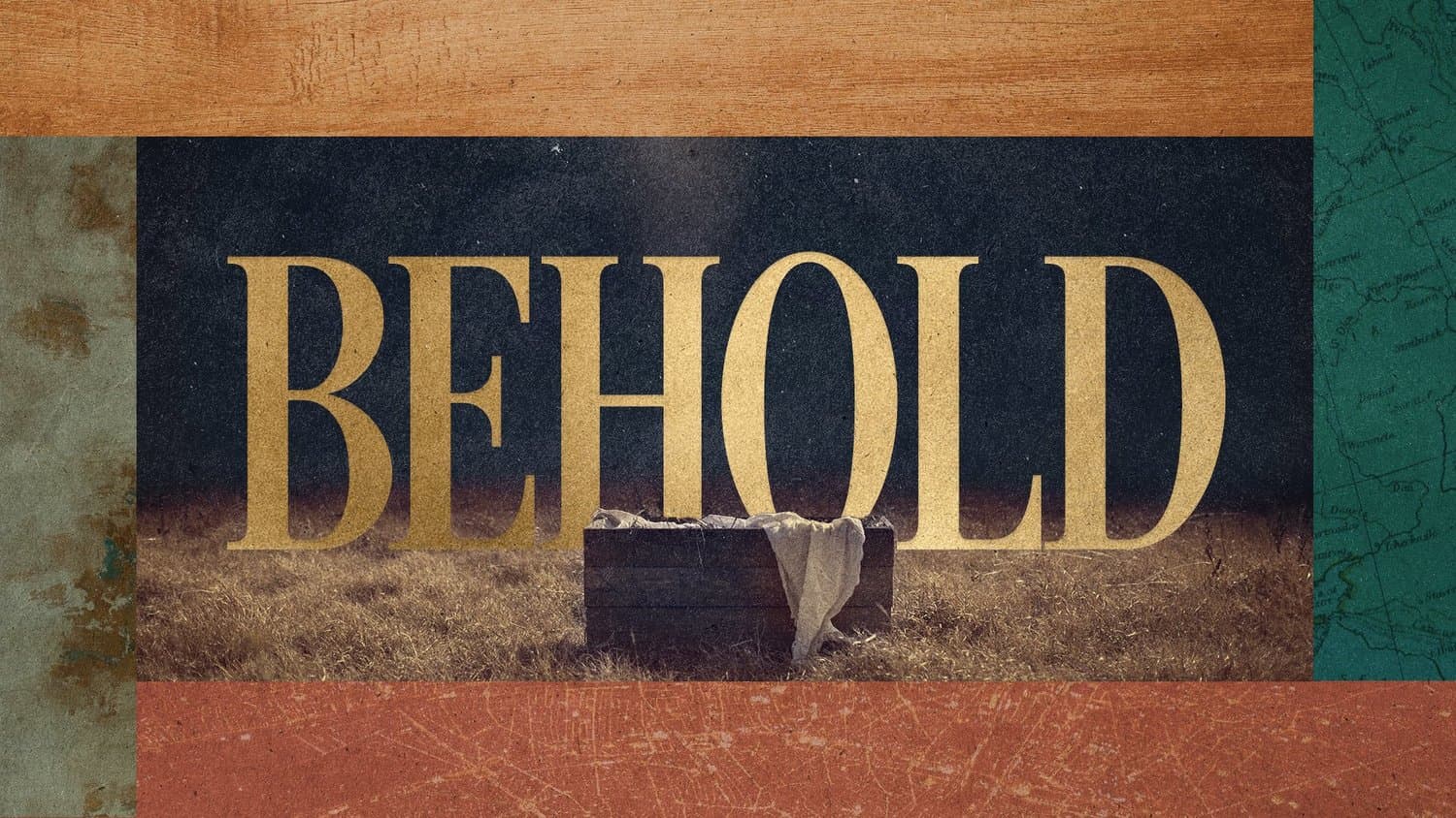 A Christmas title slide reading BEHOLD in gold serif over a night photo of an empty wooden manger in a field, framed by wood, rust and green paper panels.
