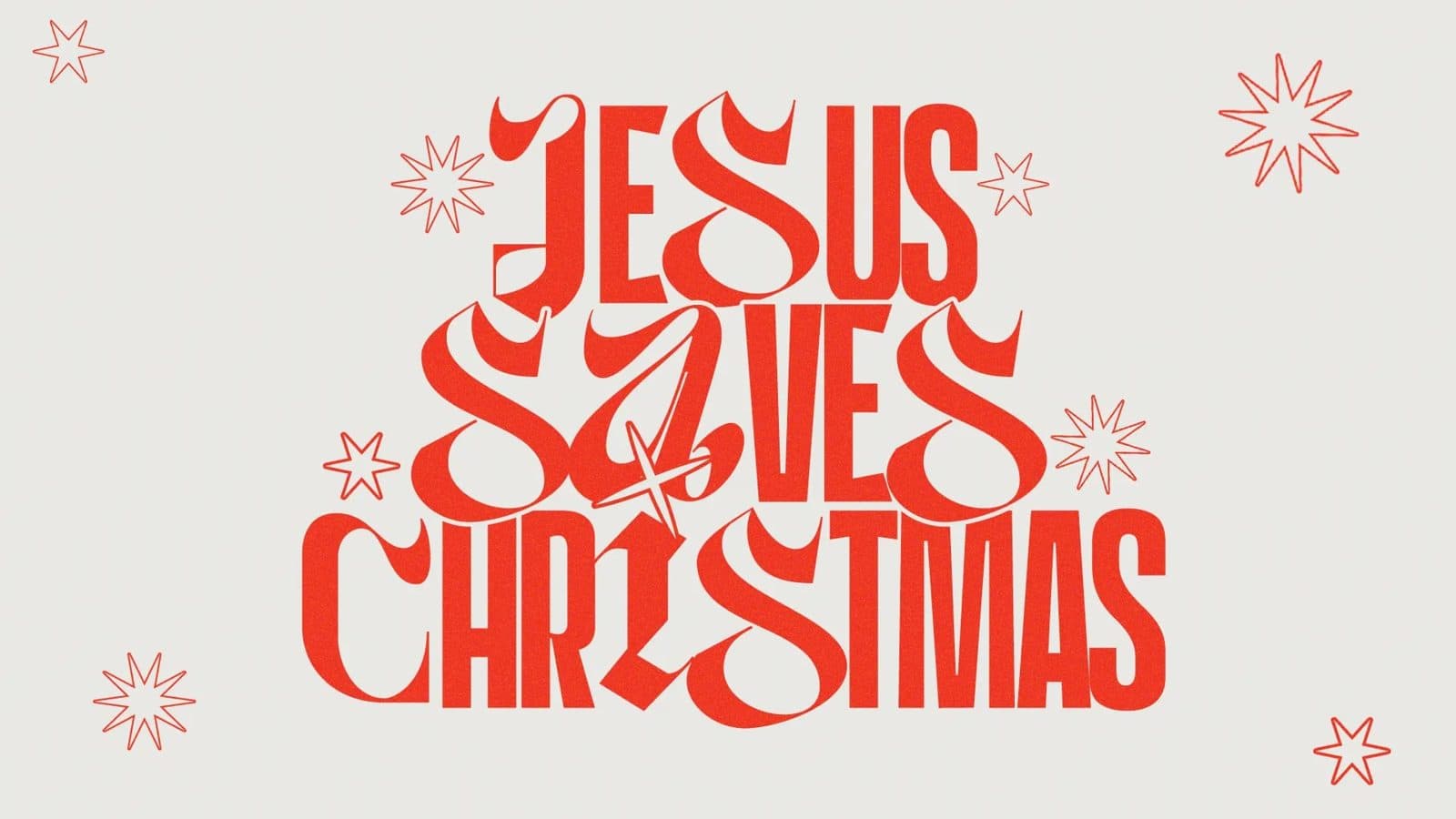 Off-white graphic with red retro lettering reading Jesus Saves Christmas and starburst accents