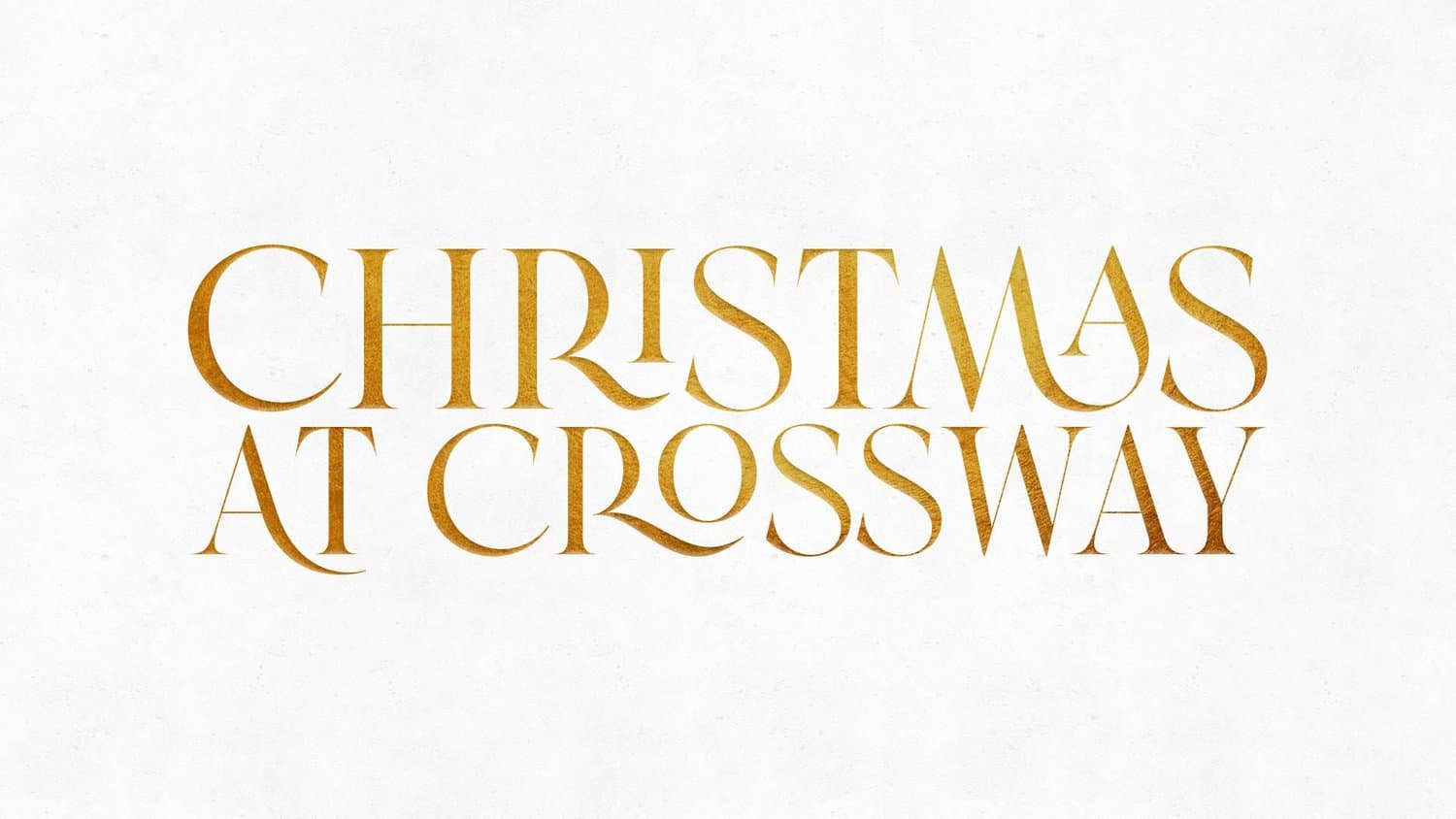 A white Christmas title slide reading CHRISTMAS AT CROSSWAY in two lines of gold foil display serif capitals with ornate swashes, on a plain textured ground.