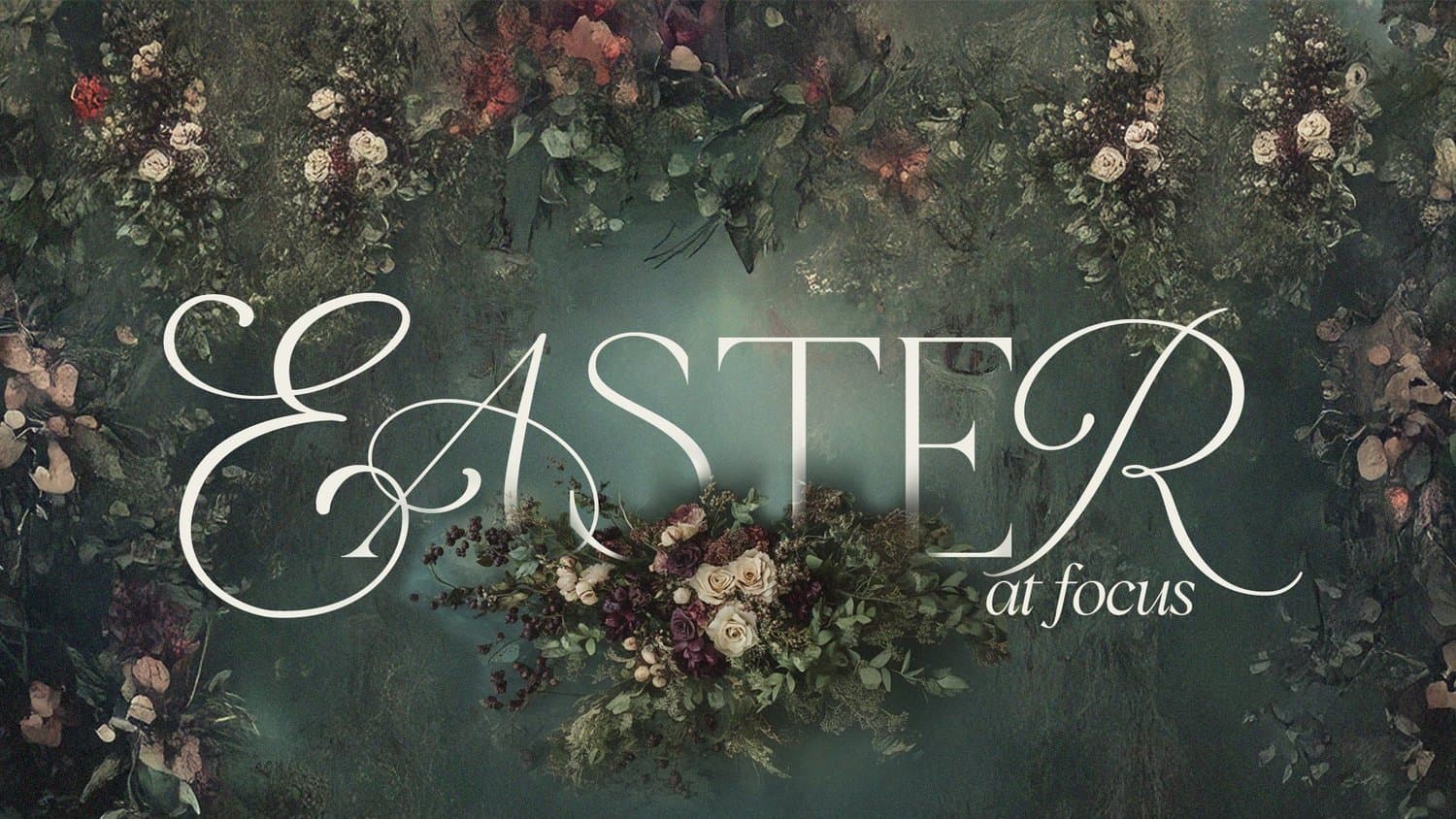 An Easter slide reading EASTER at focus in a white script serif, over a dark green wall of roses and dried florals.