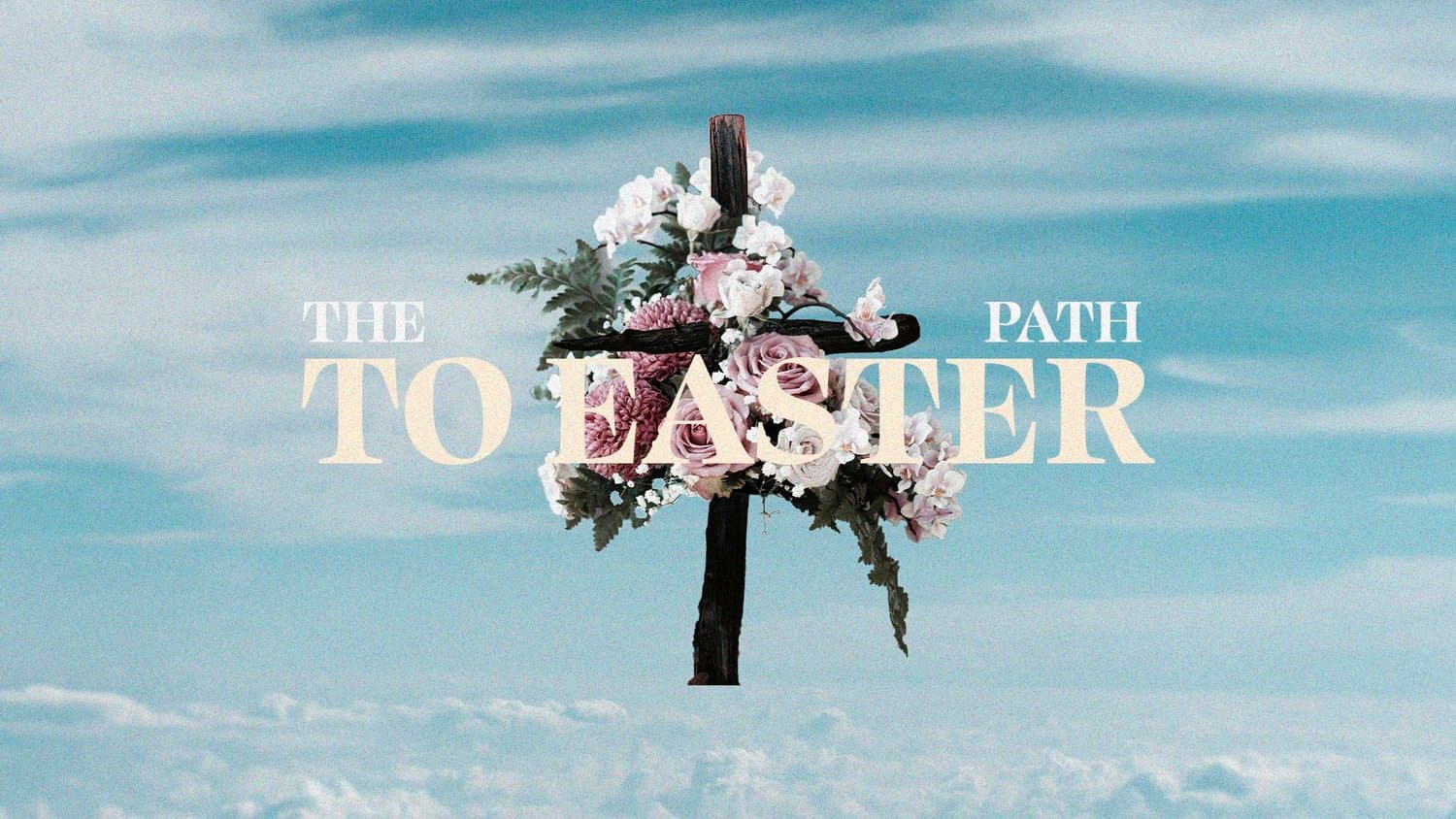 An Easter title slide reading THE PATH TO EASTER in cream serif capitals, over a flower-draped wooden cross against a pale blue sky.