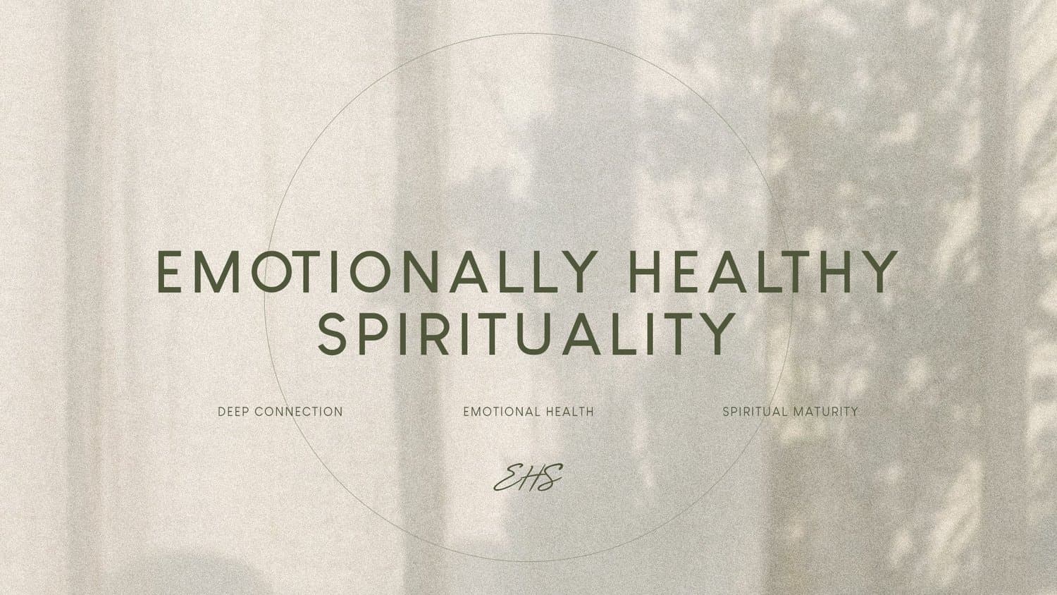 A soft neutral sermon slide reading EMOTIONALLY HEALTHY SPIRITUALITY in letterspaced green capitals, over a curtain with leaf shadows.