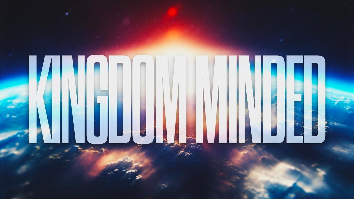 A sermon title slide reading KINGDOM MINDED in white sans-serif over a dark space scene with the earth's curved horizon and orange light at the bottom.