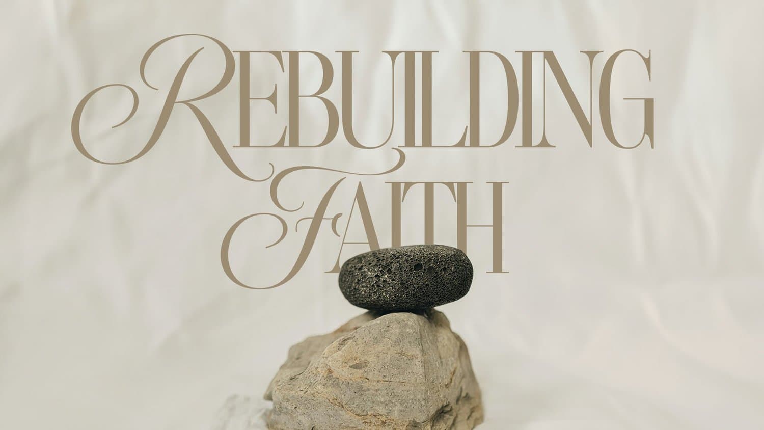 A sermon title slide reading Rebuilding Faith in elegant tan serif over cream background with stacked river rocks as central image.