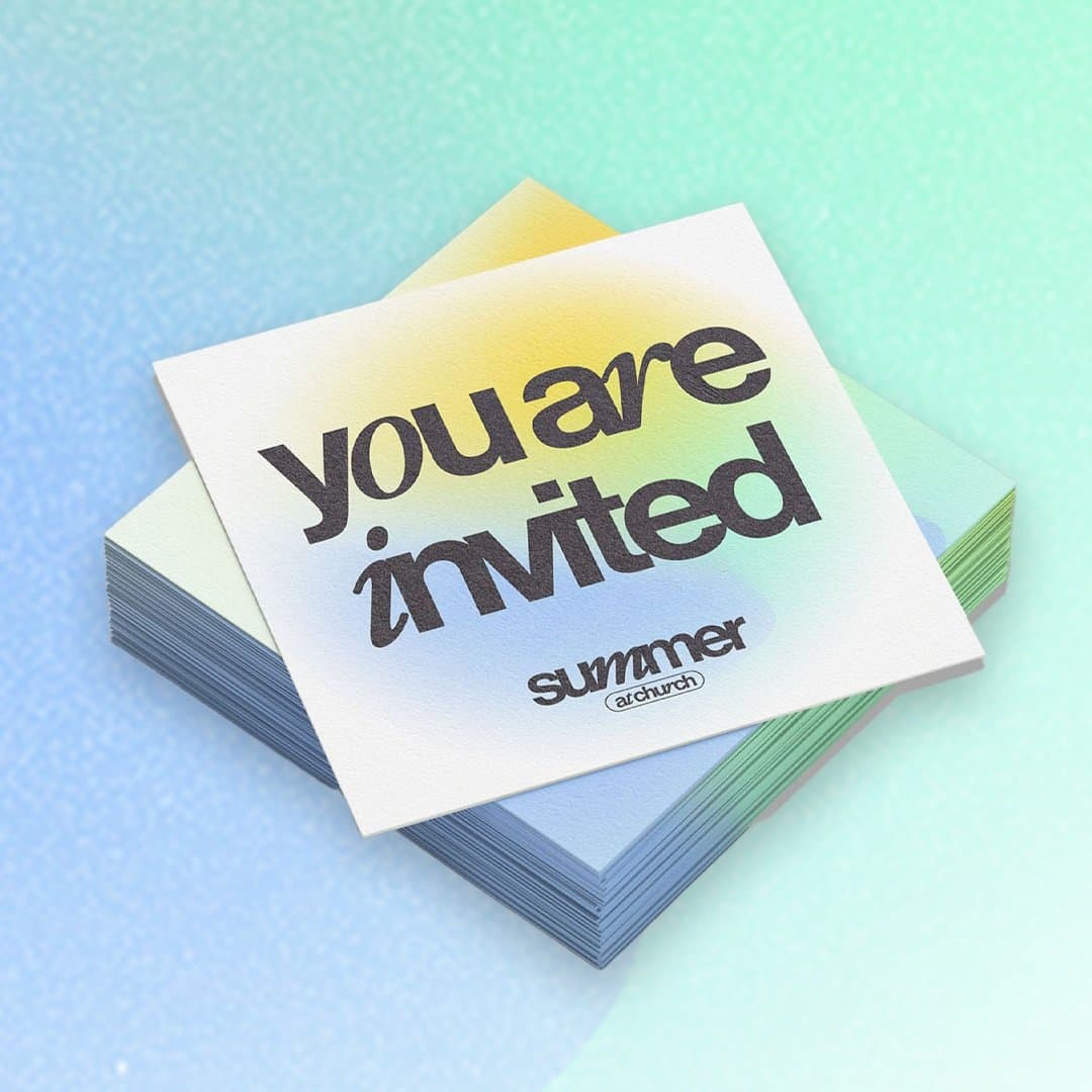 A stack of square invite cards printed you are invited in black lowercase over a yellow, green and blue gradient, with a summer at church logo lockup.